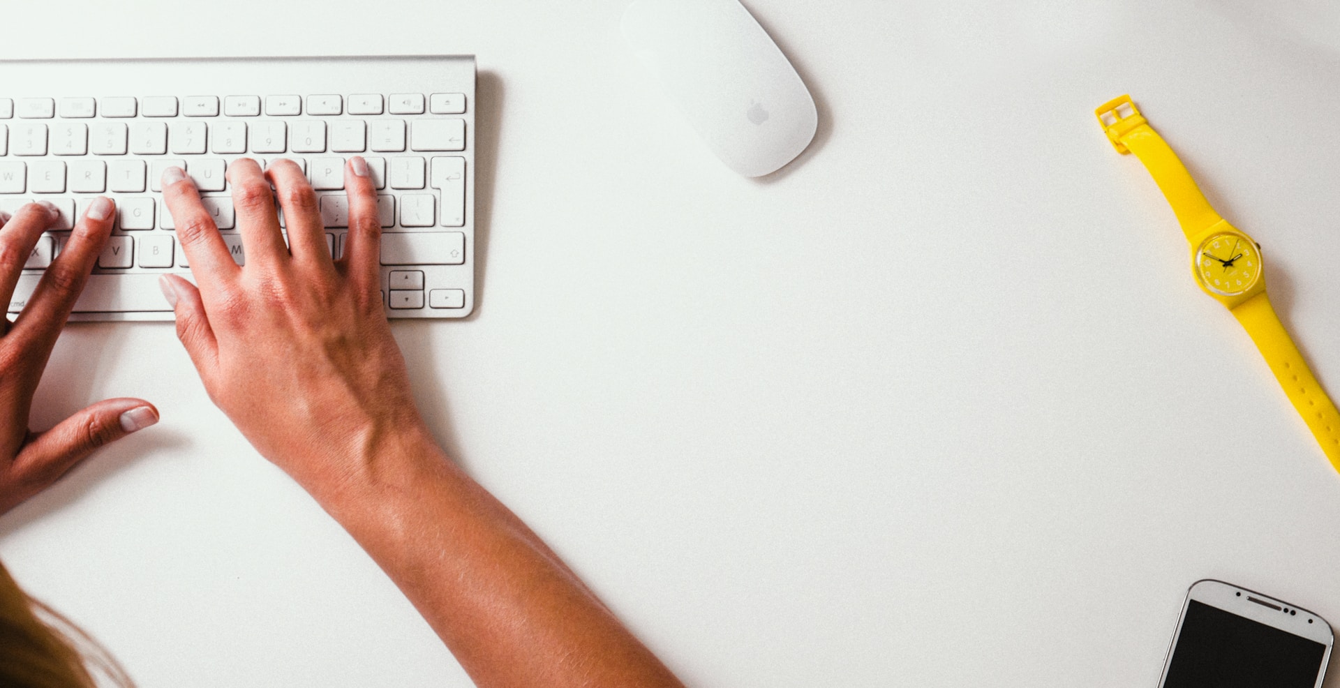 A person typing on a keyboard-Custom Merchandise